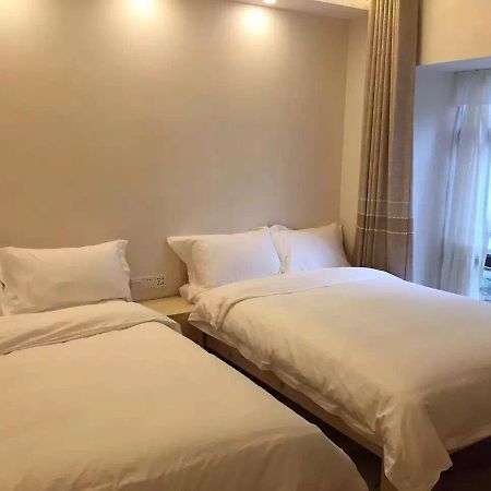 ז'אנגג'יאג'י Dingding Inn מראה חיצוני תמונה