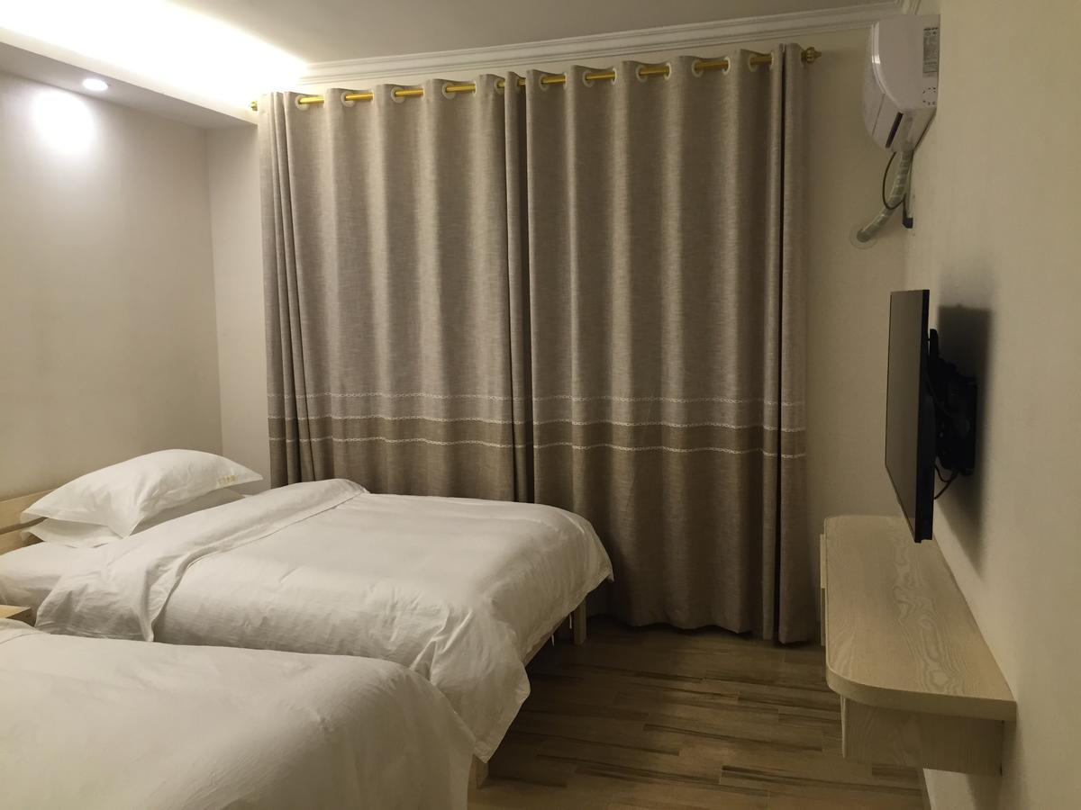 ז'אנגג'יאג'י Dingding Inn מראה חיצוני תמונה