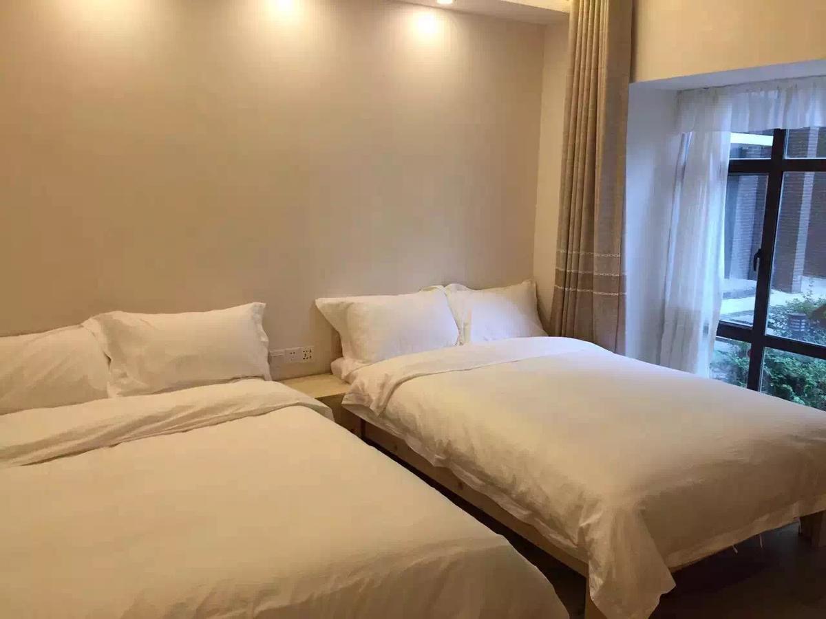 ז'אנגג'יאג'י Dingding Inn מראה חיצוני תמונה