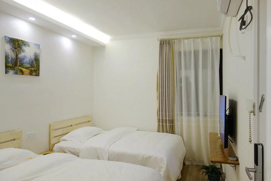 ז'אנגג'יאג'י Dingding Inn מראה חיצוני תמונה